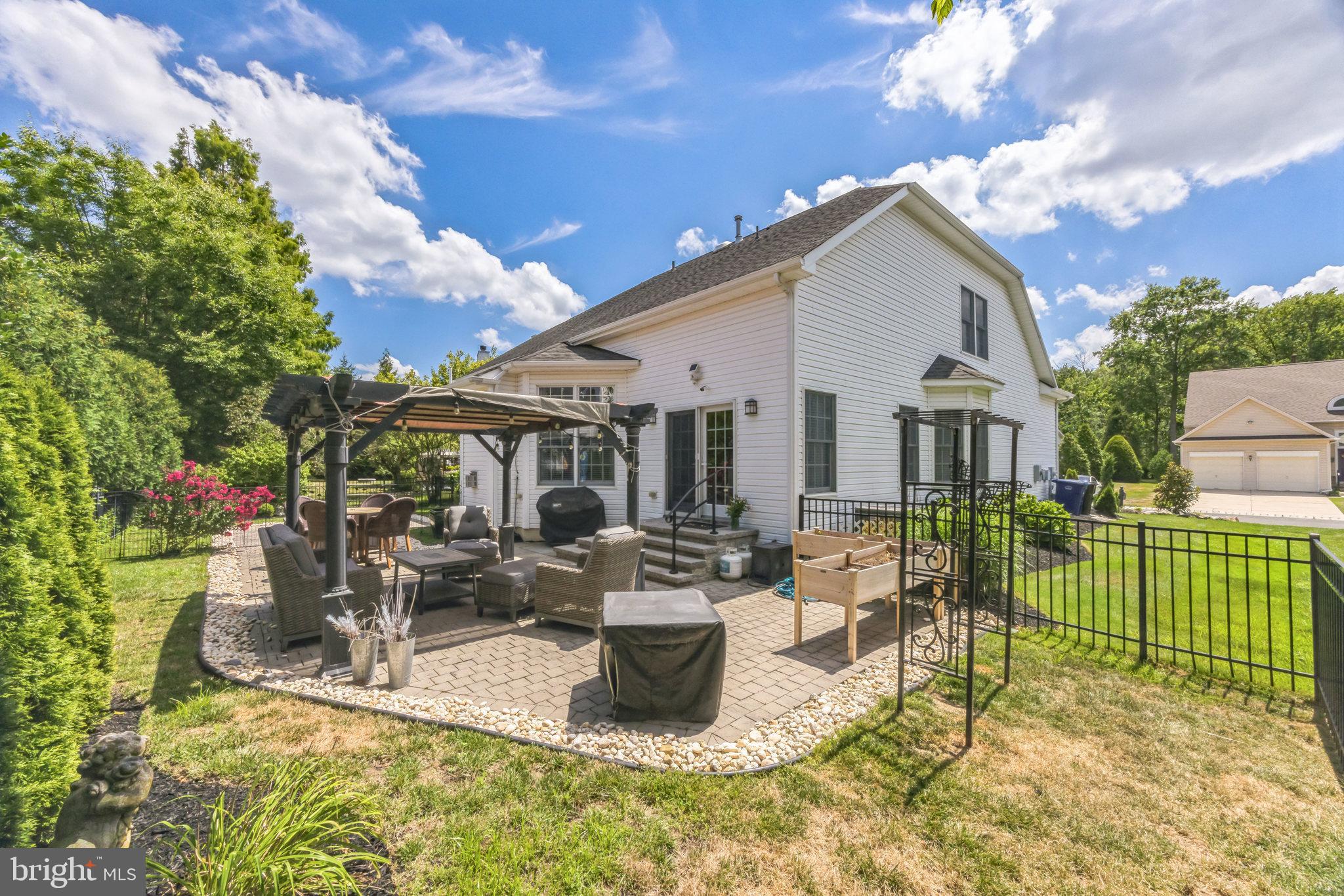 8 Kelso Lane Cinnaminson, NJ 08077 - Photo 30 of 38 a view of a house with backyard porch and sitting area