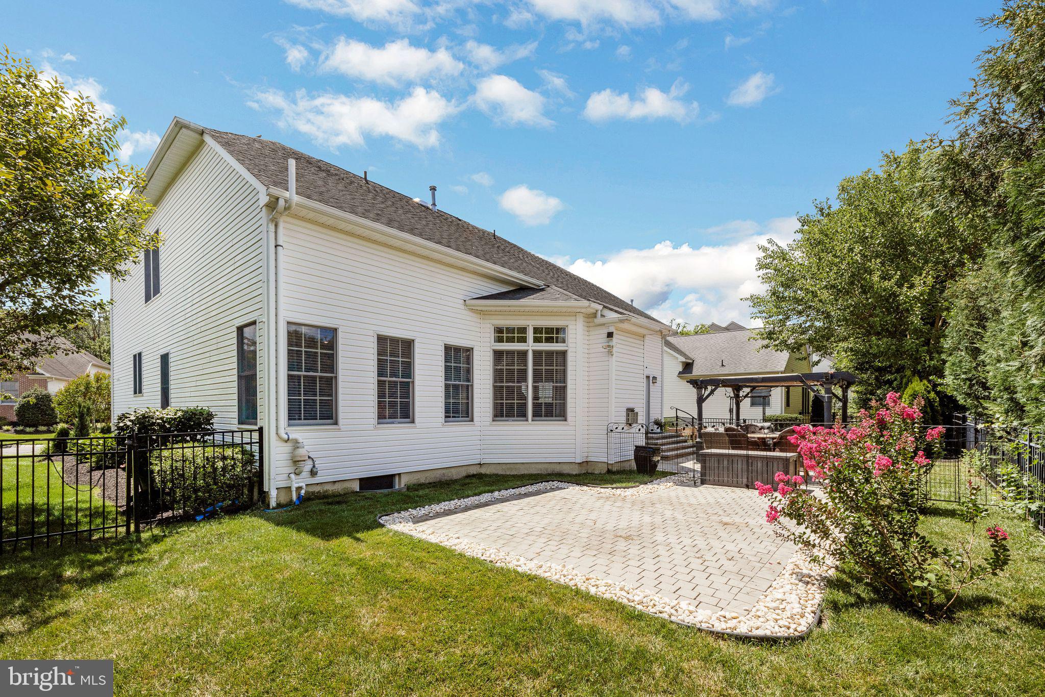 8 Kelso Lane Cinnaminson, NJ 08077 - Photo 31 of 38 a front view of house with yard outdoor seating and barbeque oven