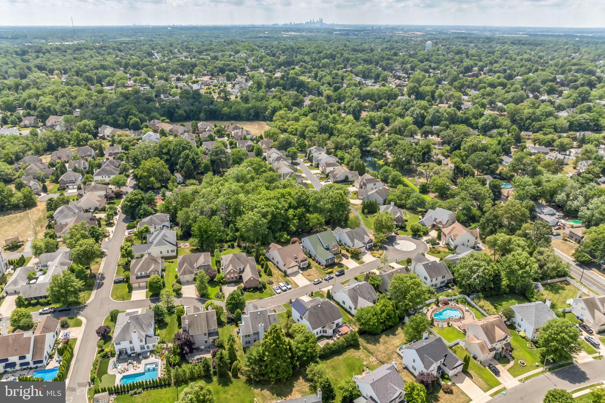 8 Kelso Lane Cinnaminson, NJ 08077 - Photo 38 of 38 an aerial view of residential houses with outdoor space and trees