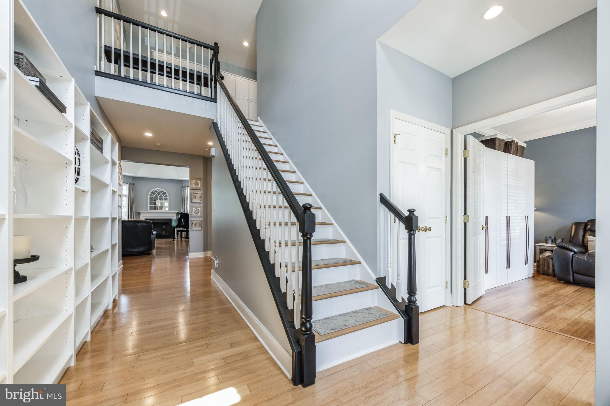 8 Kelso Lane Cinnaminson, NJ 08077 - Photo 5 of 38 a view of staircase with white walls and a rug