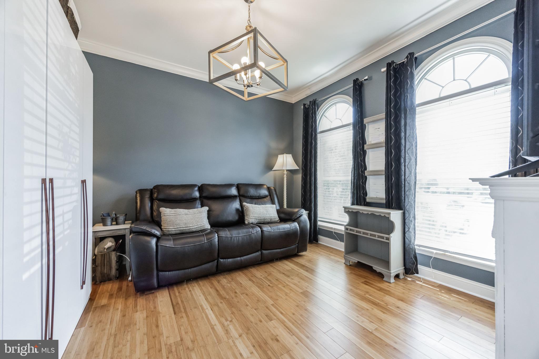 8 Kelso Lane Cinnaminson, NJ 08077 - Photo 7 of 38 a living room with furniture and a large window