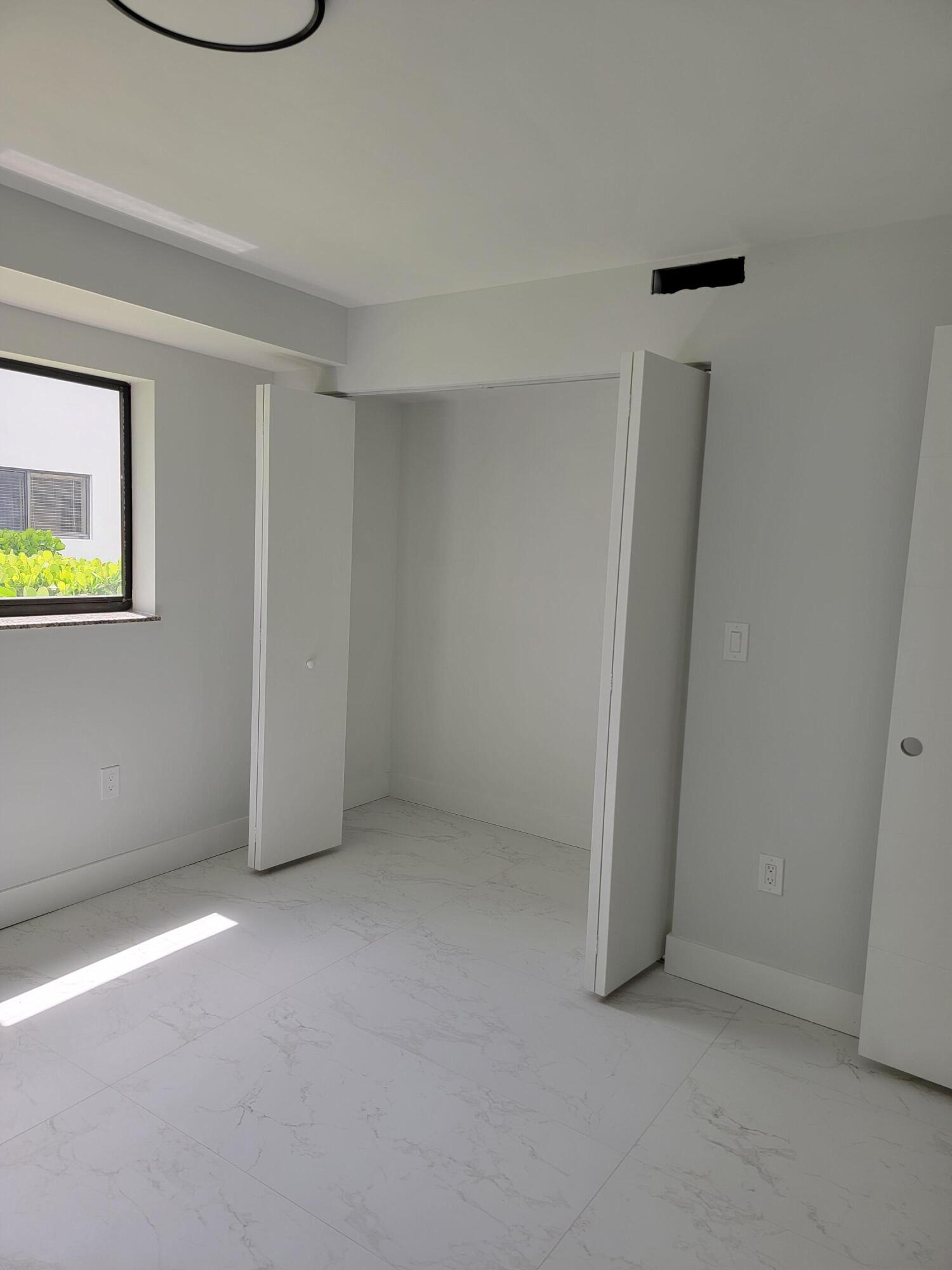 240 Southwest 7th Street, Unit 9 Boca Raton, FL 33432 - Photo 9 of 25 20260623_114142