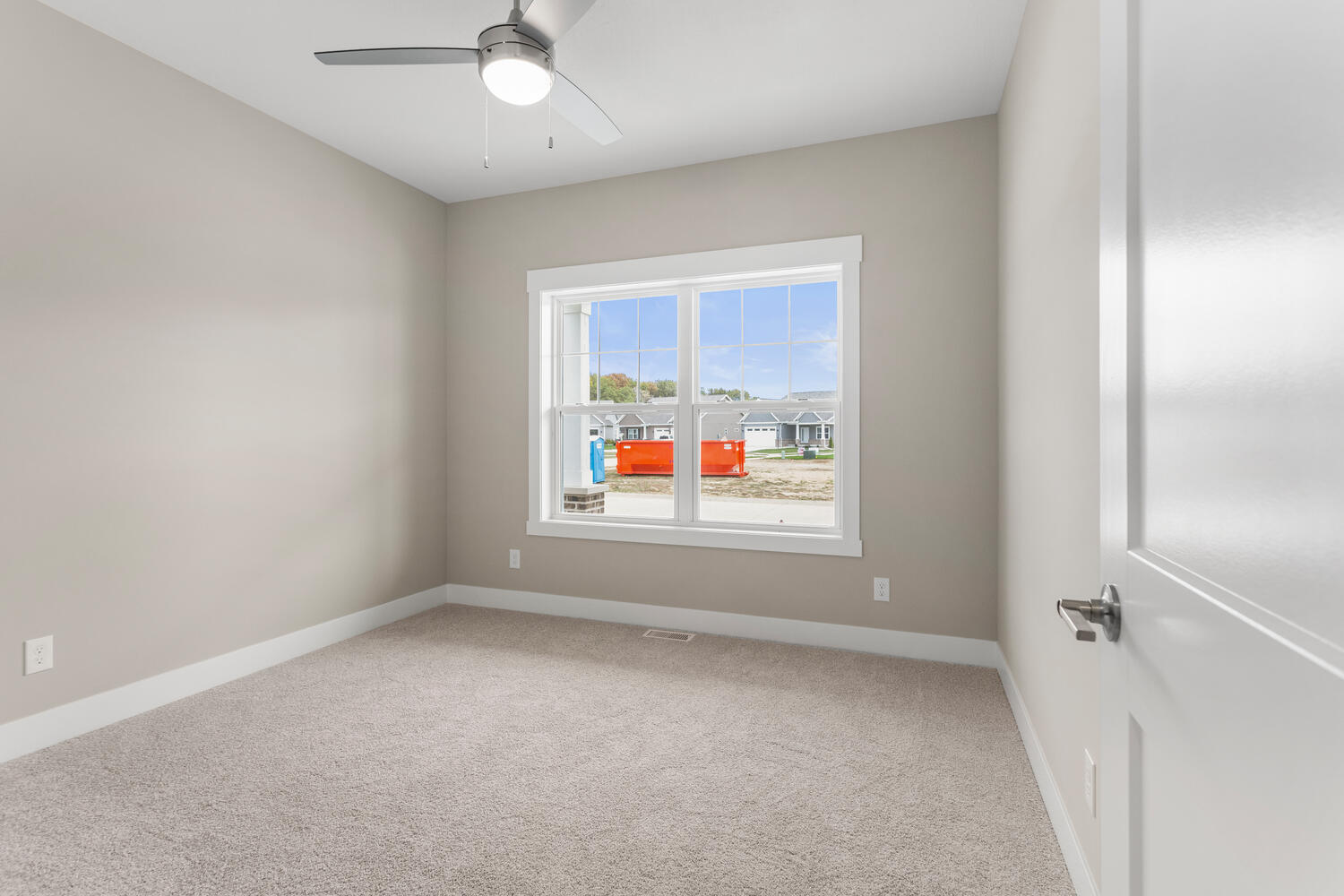 4 Forest Drive Monticello, IL 61856 - Photo 17 of 34 an empty room with window ceiling fan and windows