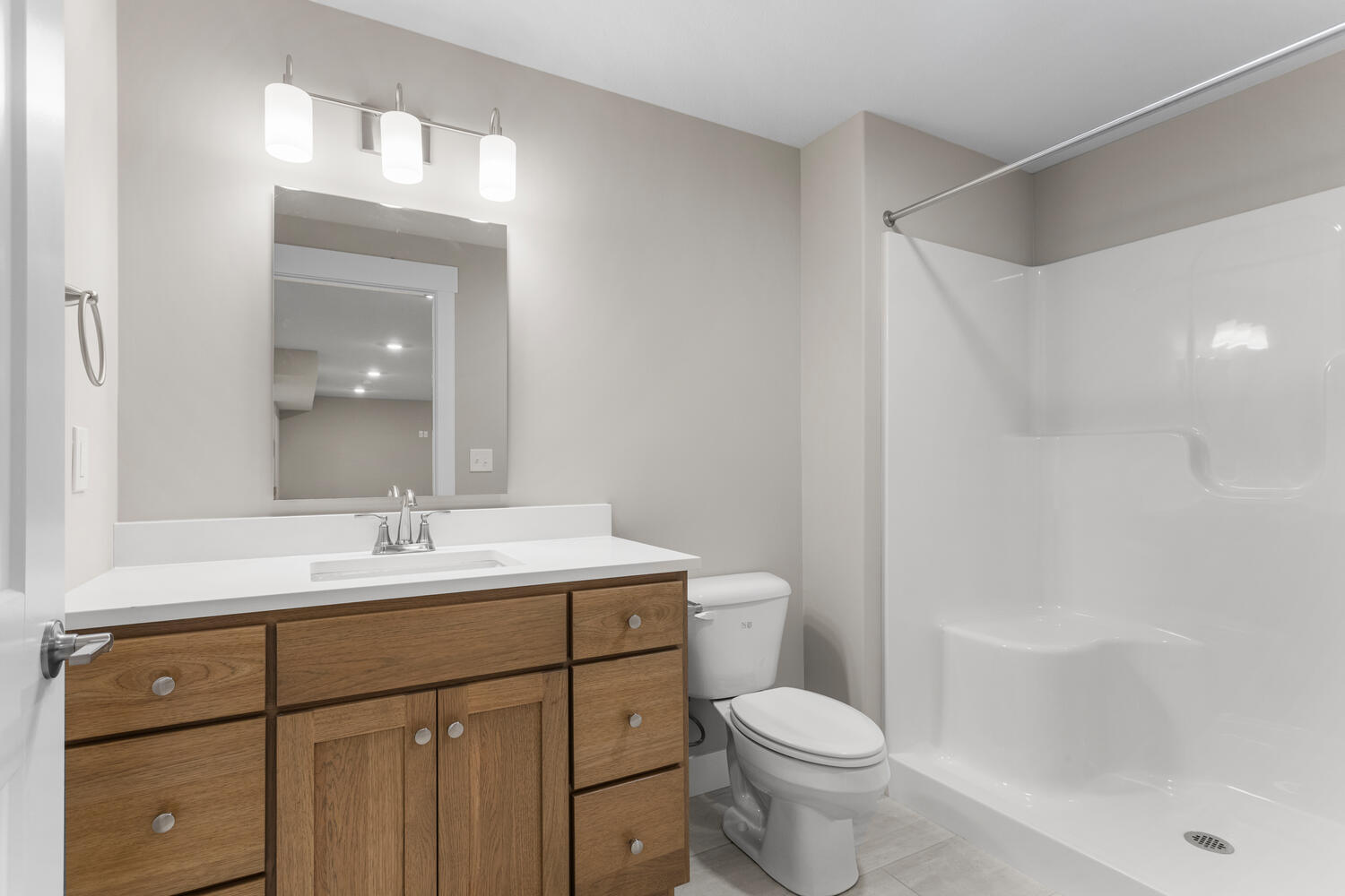 4 Forest Drive Monticello, IL 61856 - Photo 25 of 34 a bathroom with a sink toilet vanity and shower