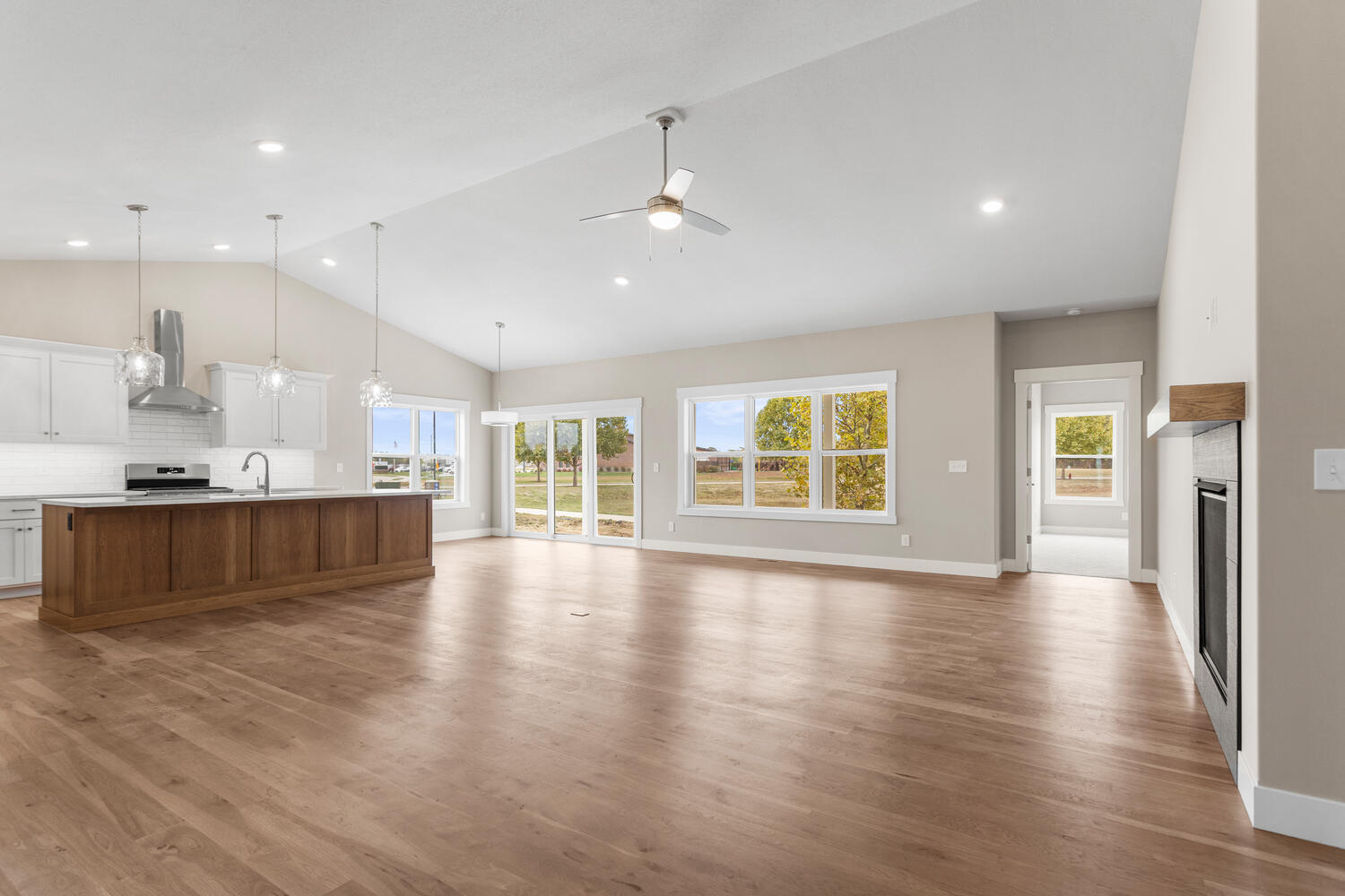 4 Forest Drive Monticello, IL 61856 - Photo 4 of 34 a view of an empty room with wooden floor and a window