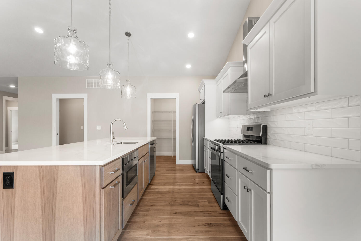 4 Forest Drive Monticello, IL 61856 - Photo 8 of 34 a kitchen with stainless steel appliances a sink stove and cabinets