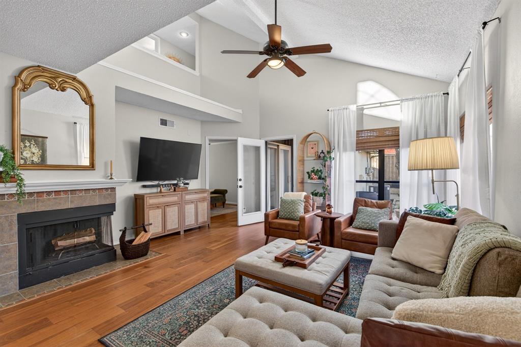 2941 Hunters Point Lane Carrollton, TX 75007 - Photo 40 of 40 a living room with furniture and a flat screen tv