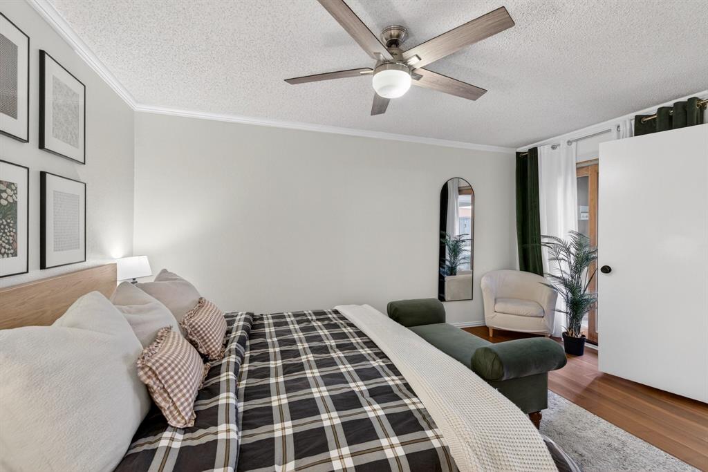 2941 Hunters Point Lane Carrollton, TX 75007 - Photo 21 of 40 a bedroom with a bed and a walk in closet