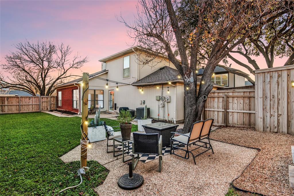 2941 Hunters Point Lane Carrollton, TX 75007 - Photo 3 of 40 a view of a house with backyard and sitting area