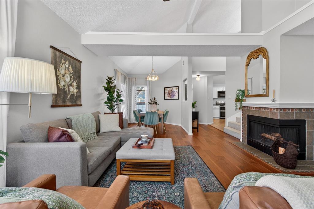 2941 Hunters Point Lane Carrollton, TX 75007 - Photo 8 of 40 a living room with furniture and a fireplace