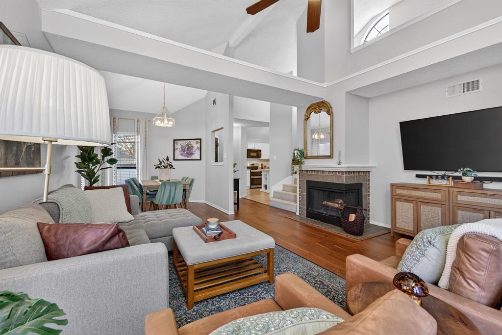 2941 Hunters Point Lane Carrollton, TX 75007 - Photo 9 of 40 a living room with furniture fireplace and flat screen tv