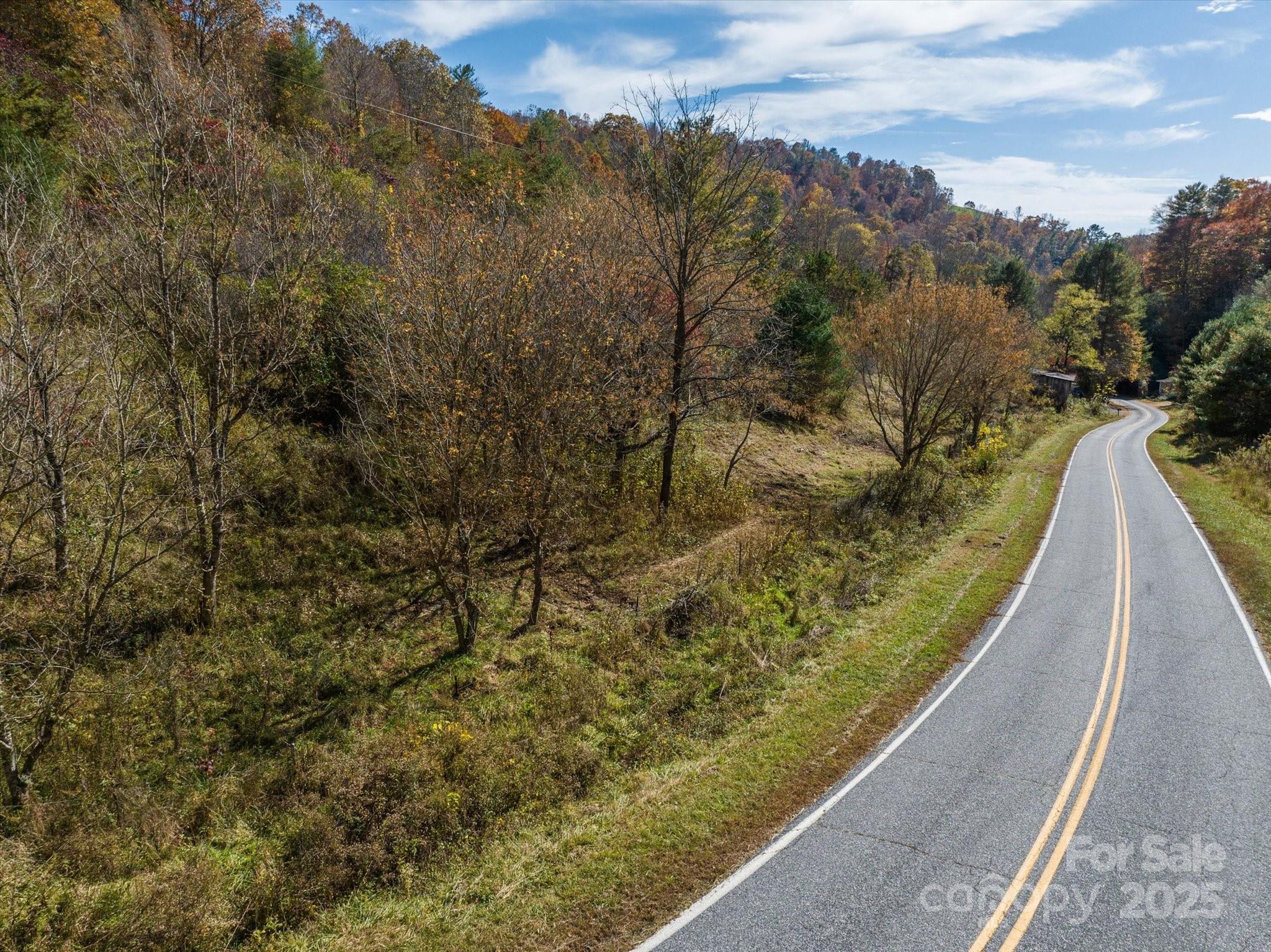 Tbd Sweet Water Road Marshall, NC 28753 - Photo 5 of 15 a view of a yard with an outdoor seating