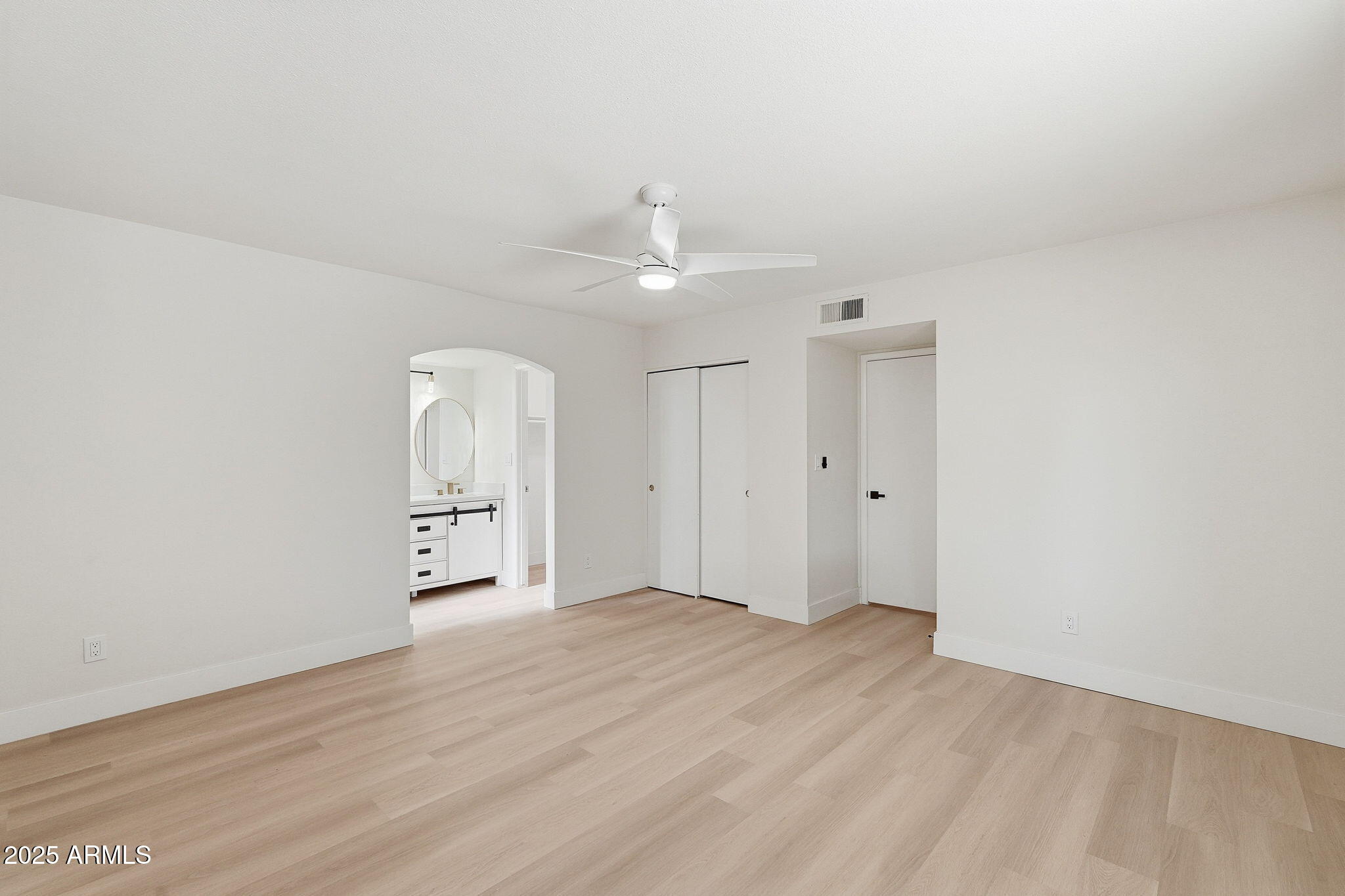 5839 West Hearn Road Glendale, AZ 85306 - Photo 17 of 35 wooden floor in an empty room