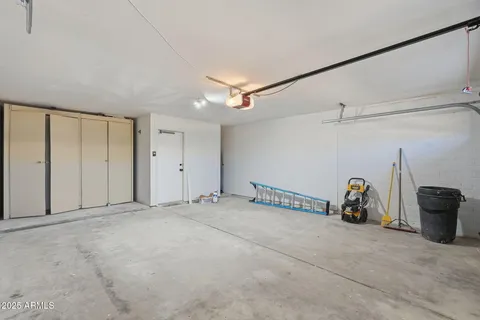 a view of backyard with large window