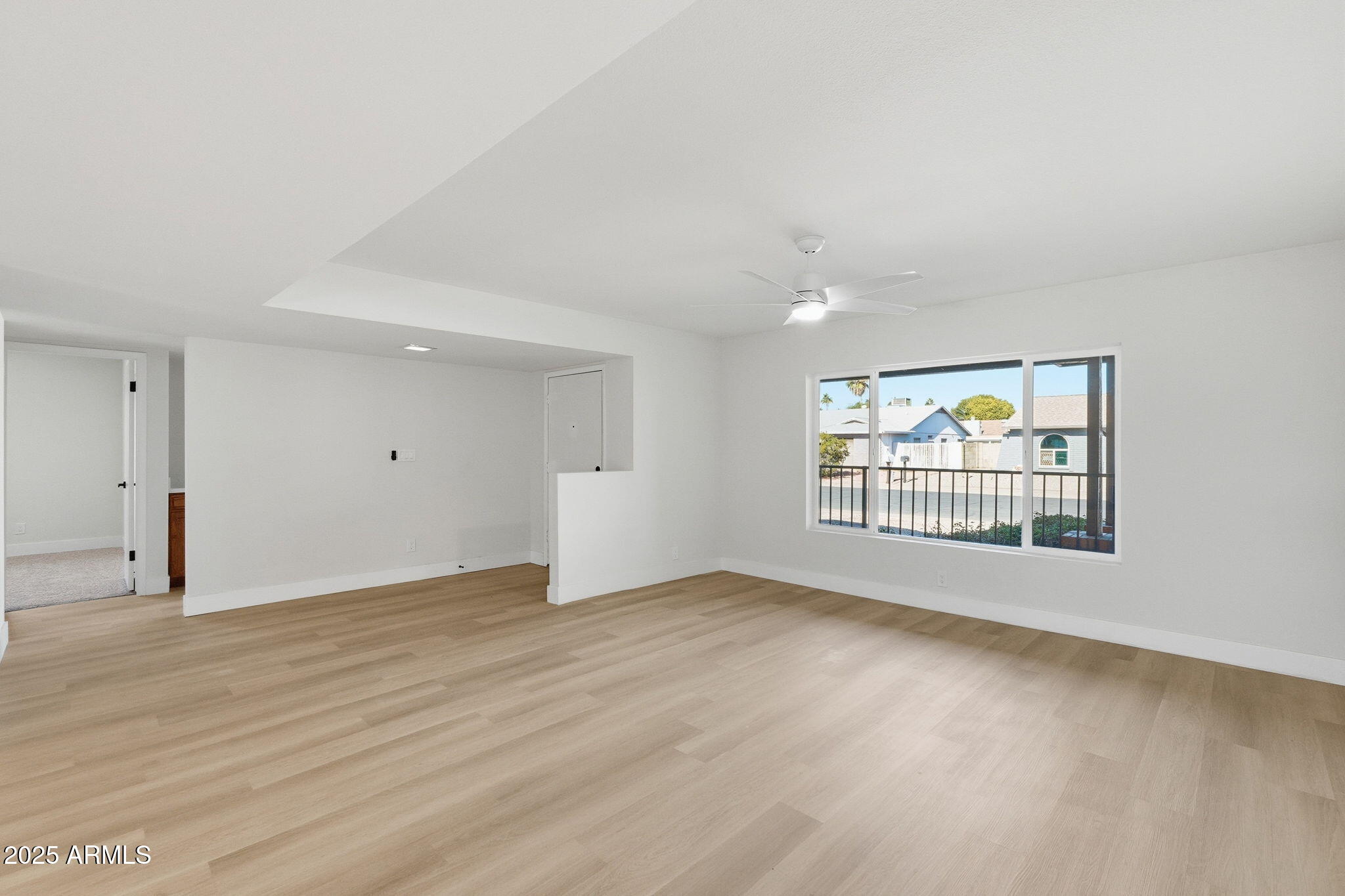 5839 West Hearn Road Glendale, AZ 85306 - Photo 5 of 35 a view of an empty room with a window