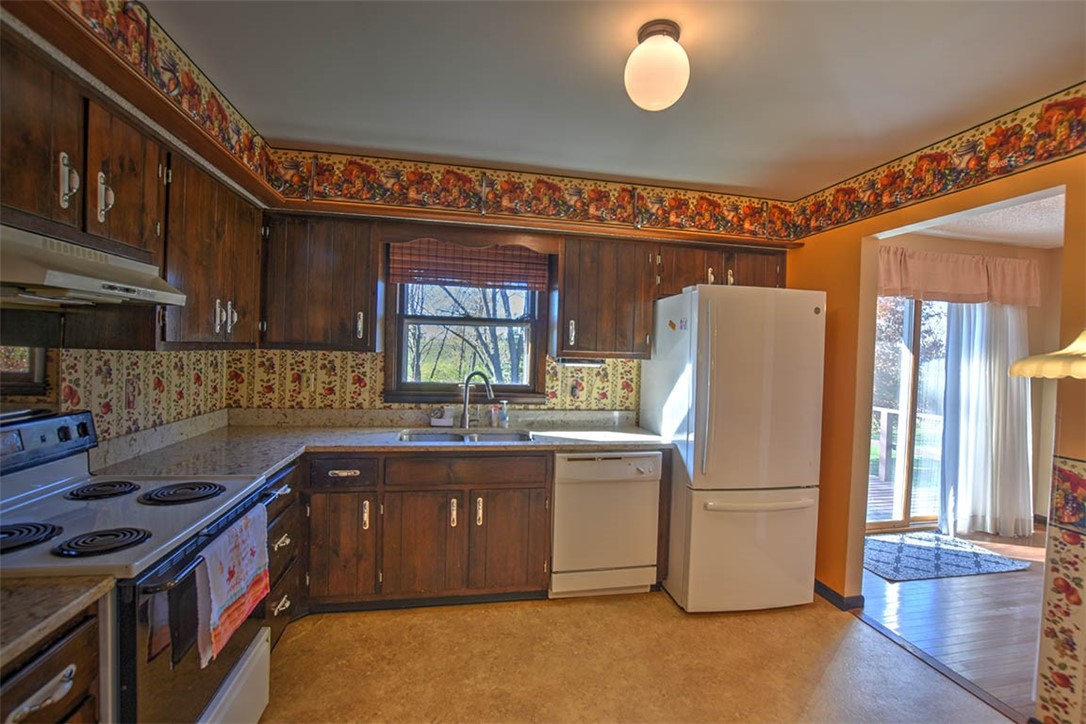 3441 Ferris Drive Decatur, IL 62521 - Photo 12 of 30 a kitchen with refrigerator and cabinets