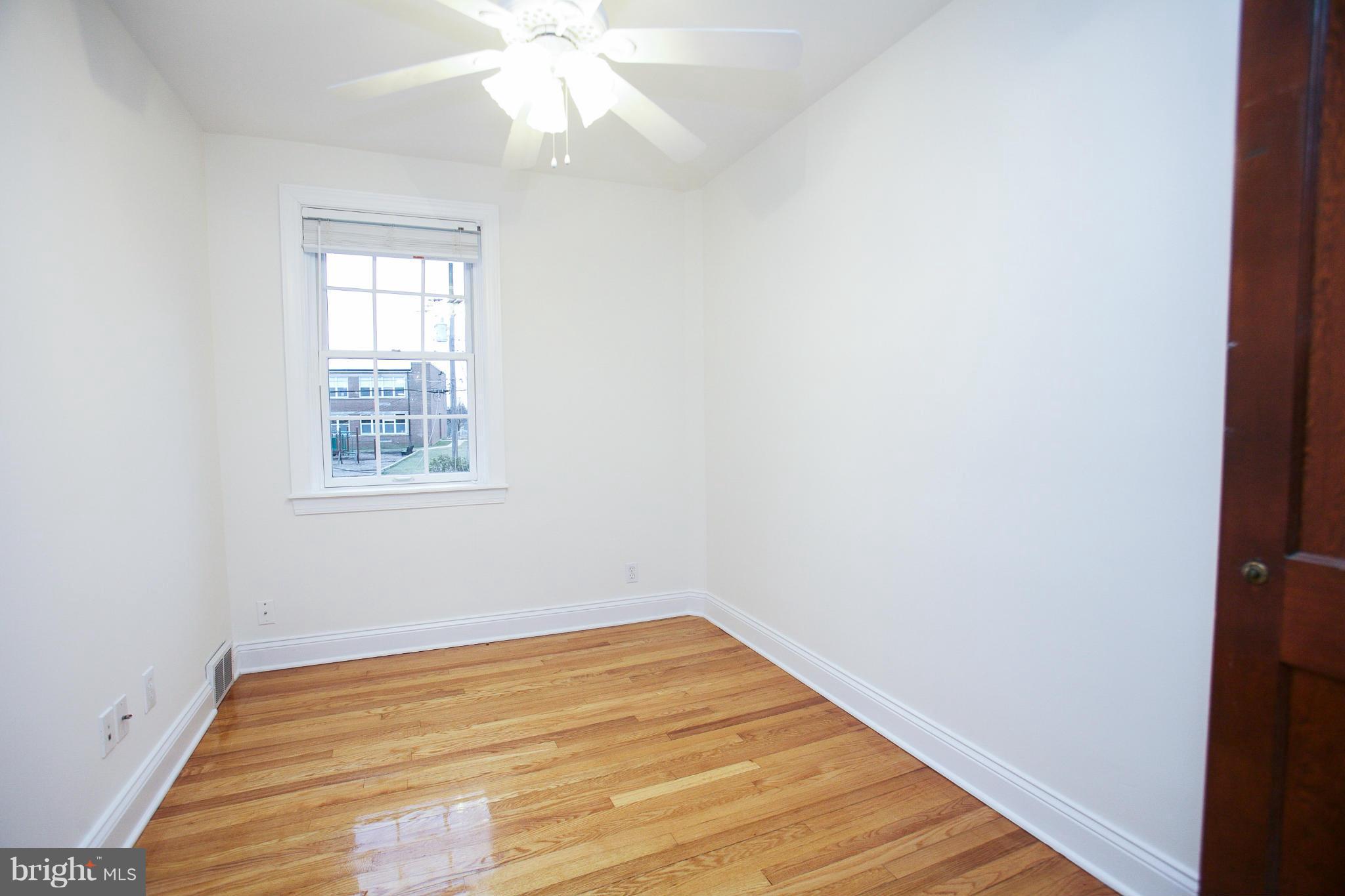 309 Overbrook Road Baltimore, MD 21212 - Photo 16 of 26 an empty room with a window