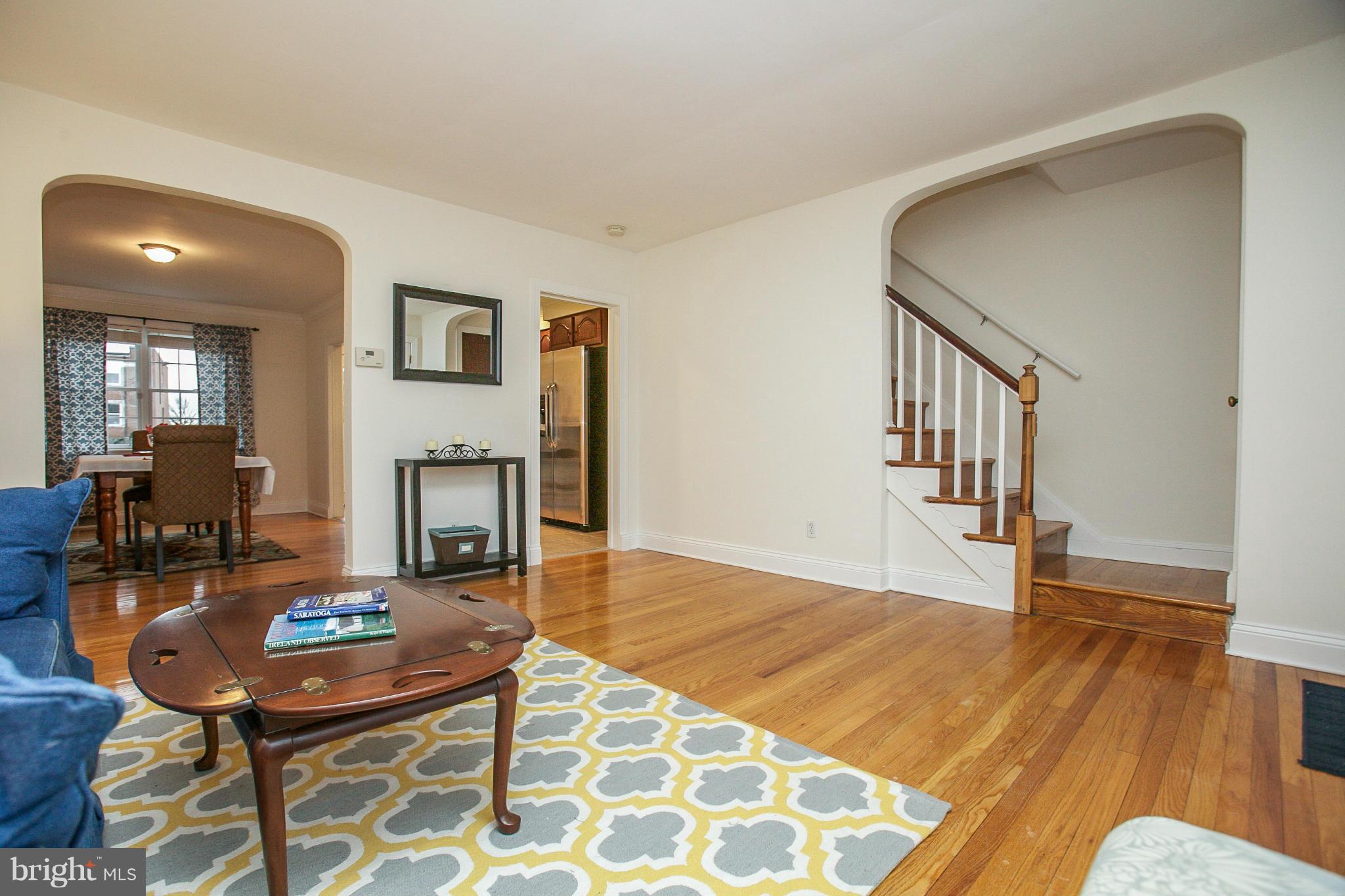 309 Overbrook Road Baltimore, MD 21212 - Photo 4 of 26 a room with furniture and wooden floor