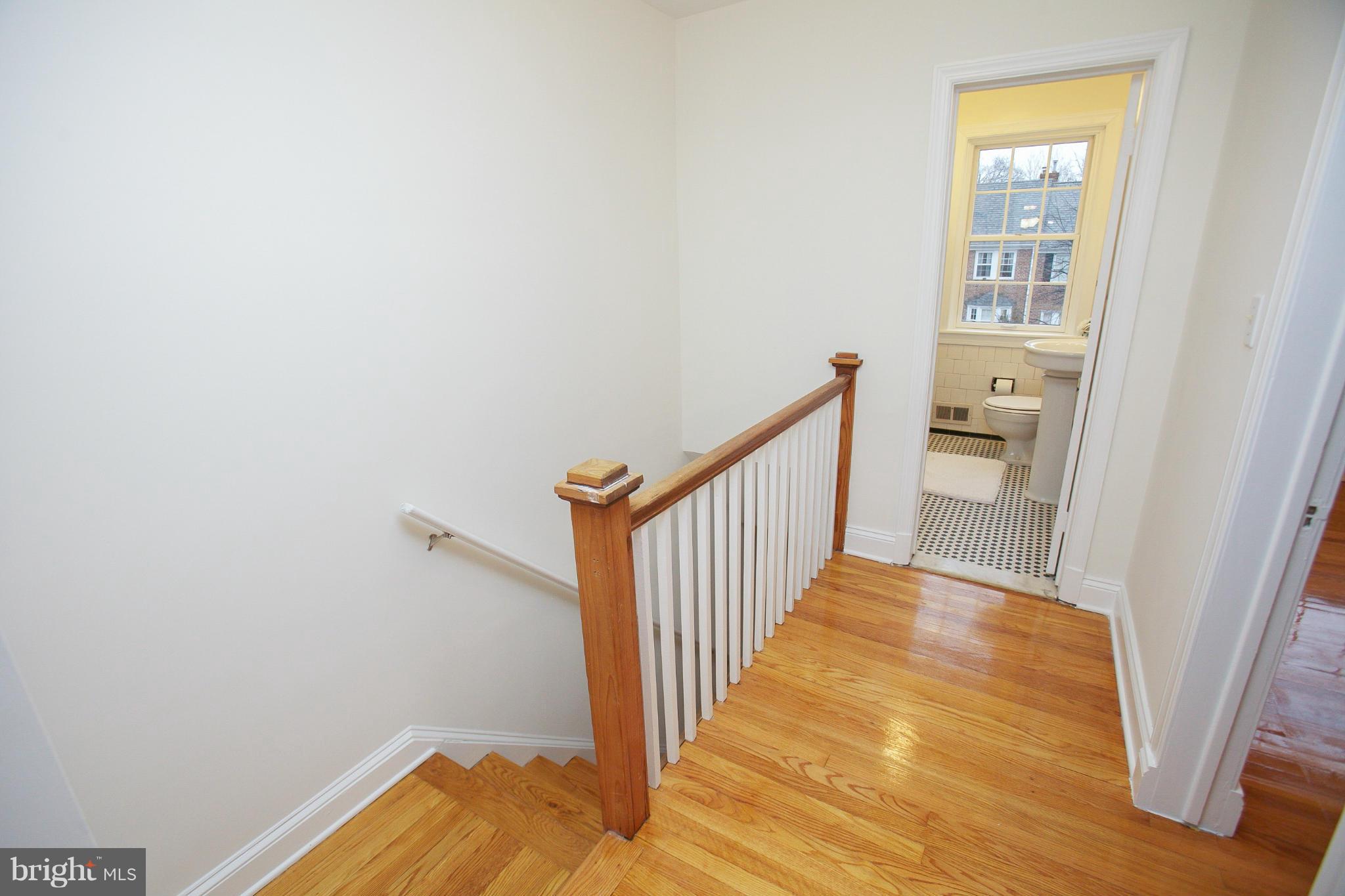 309 Overbrook Road Baltimore, MD 21212 - Photo 10 of 26 a view of a hallway with wooden floor and entryway