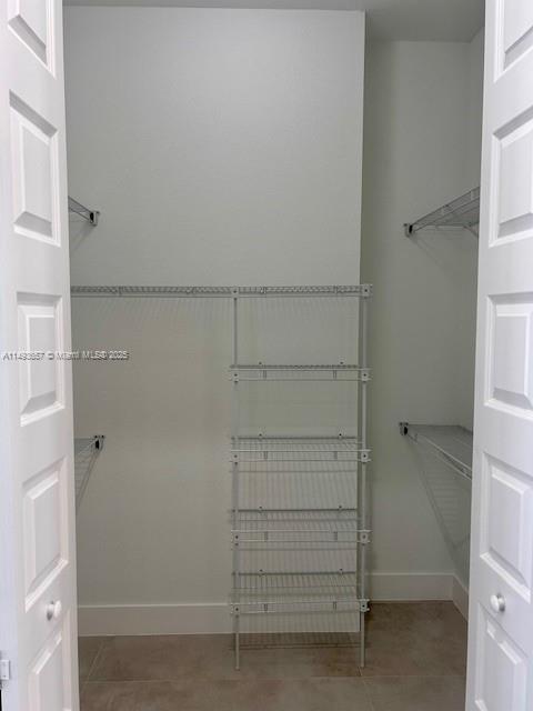 24600 Southwest 209th Place Homestead, FL 33031 - Photo 16 of 35 primary 1st closet