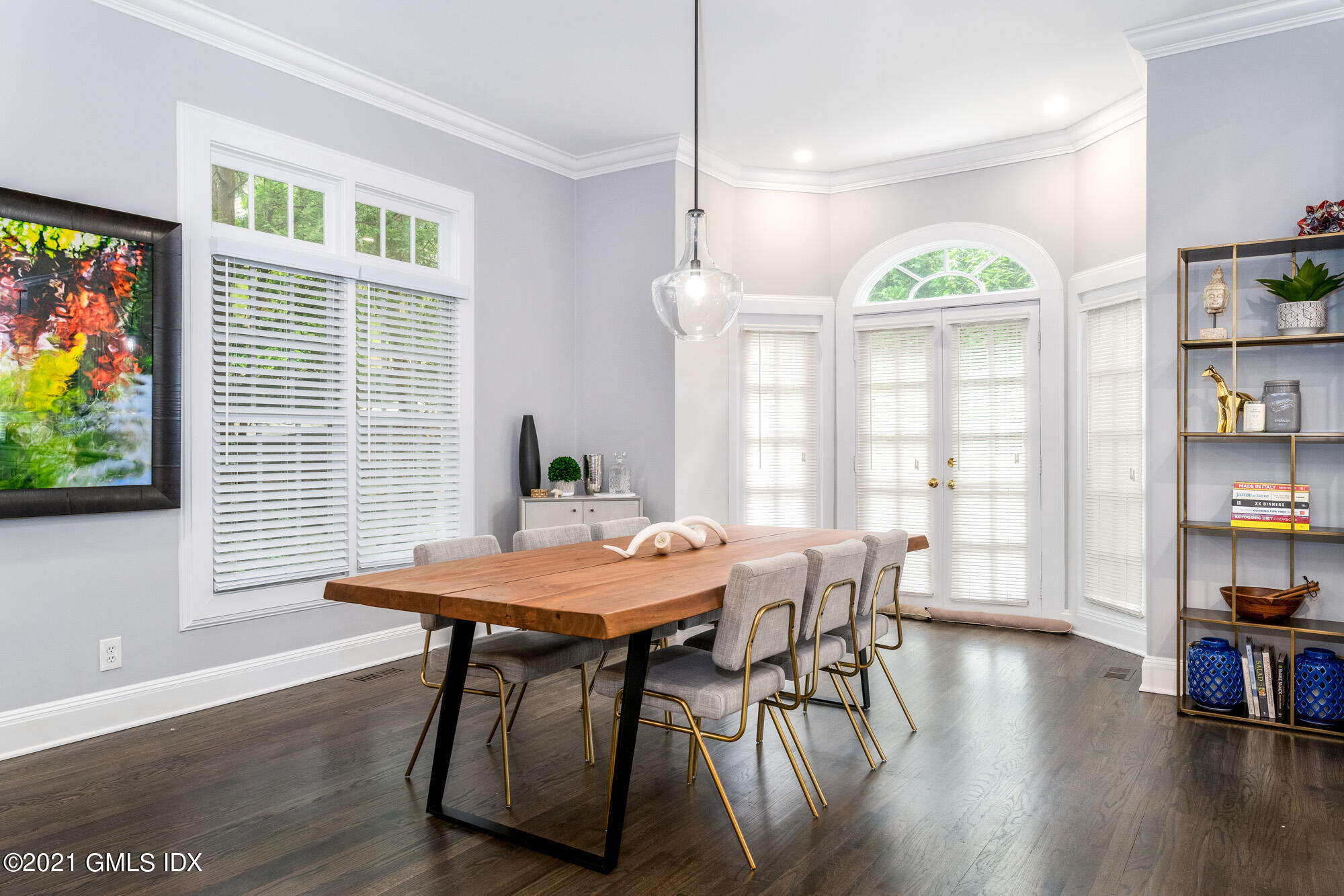 48 Spring Street, Unit 2 Greenwich, CT 06830 - Photo 11 of 36 a view of a dining room with furniture and a window
