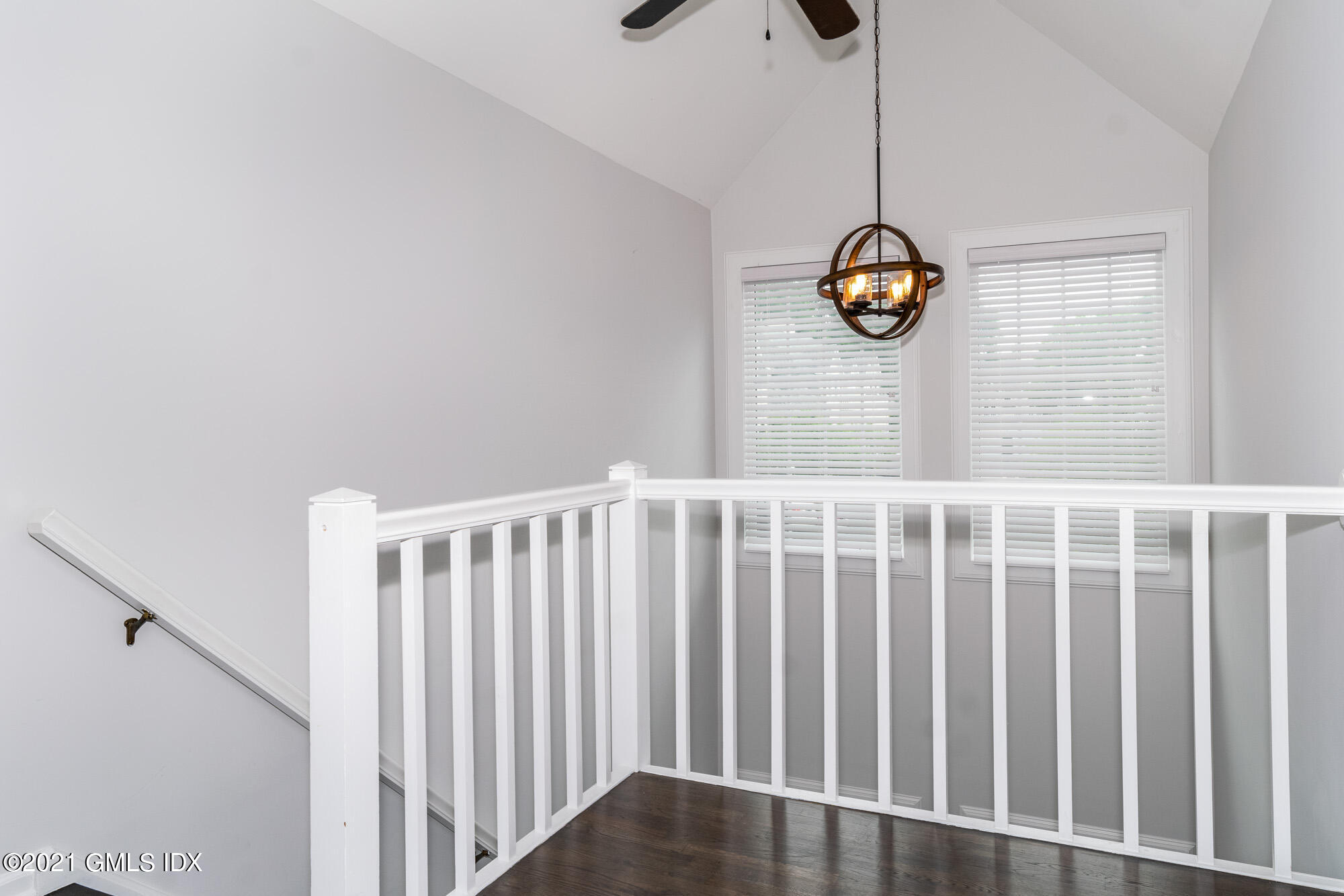 48 Spring Street, Unit 2 Greenwich, CT 06830 - Photo 18 of 36 a view of a hallway with a window