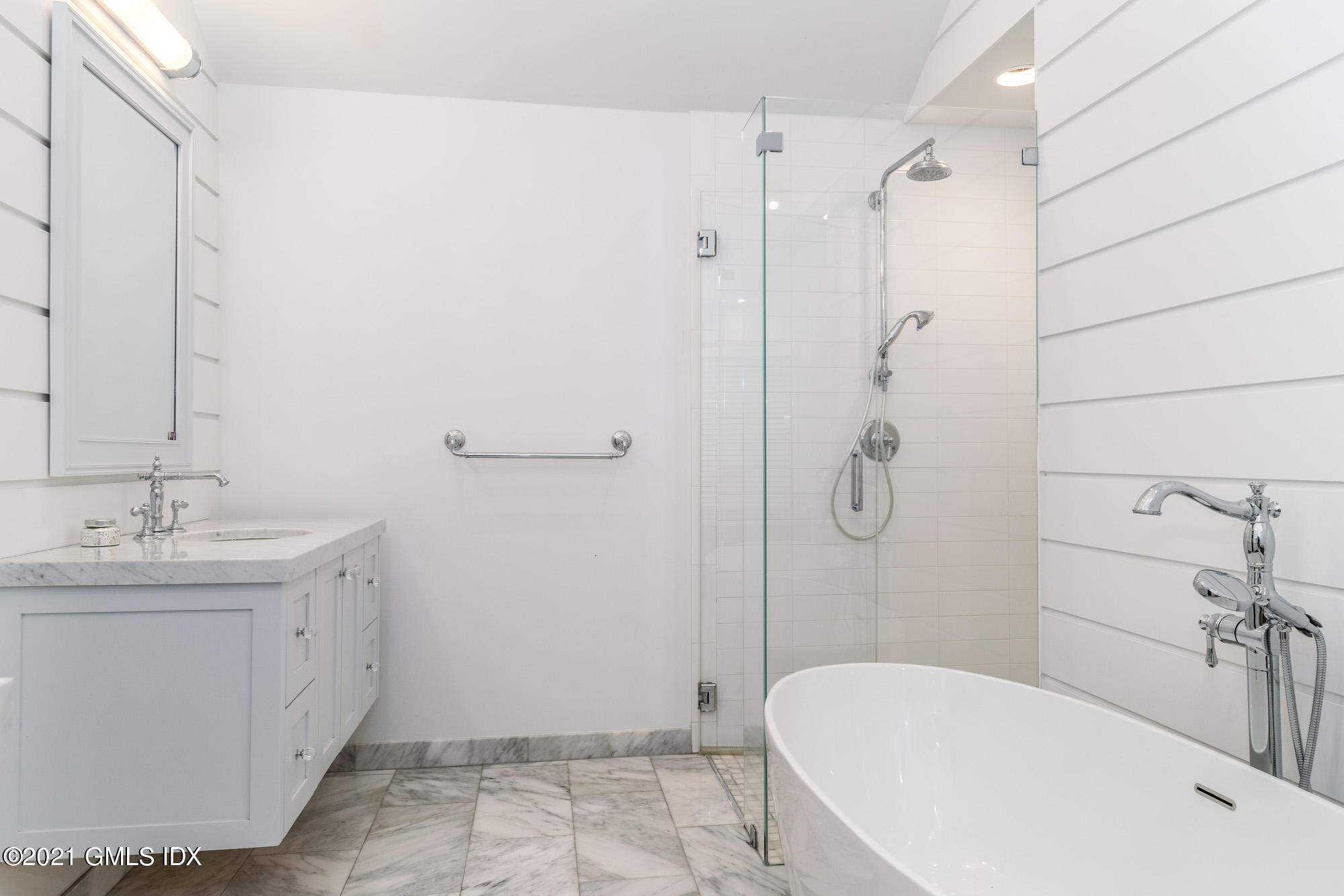 48 Spring Street, Unit 2 Greenwich, CT 06830 - Photo 25 of 36 a bathroom with a sink a toilet and shower