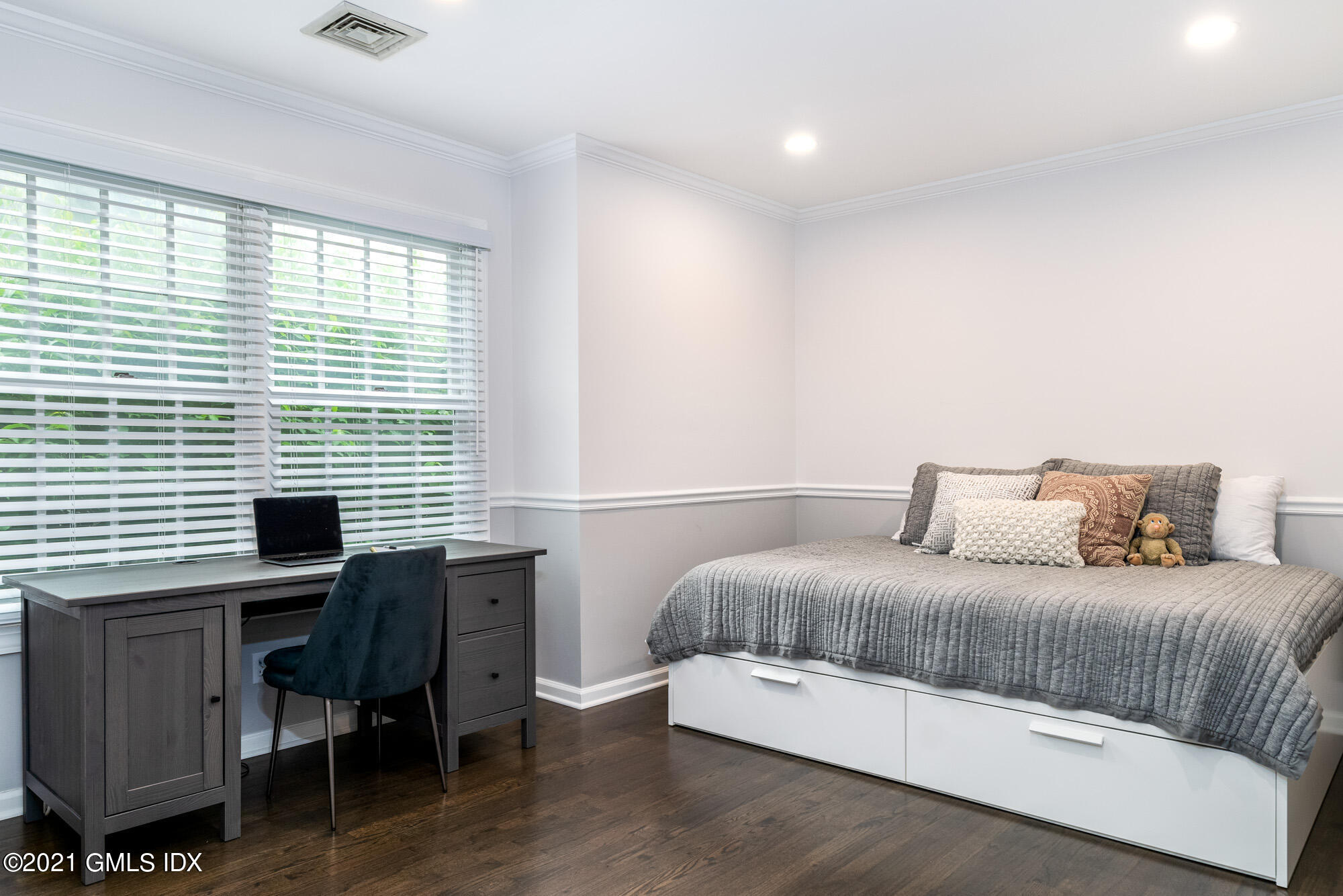 48 Spring Street, Unit 2 Greenwich, CT 06830 - Photo 27 of 36 a bedroom with a bed and a desk