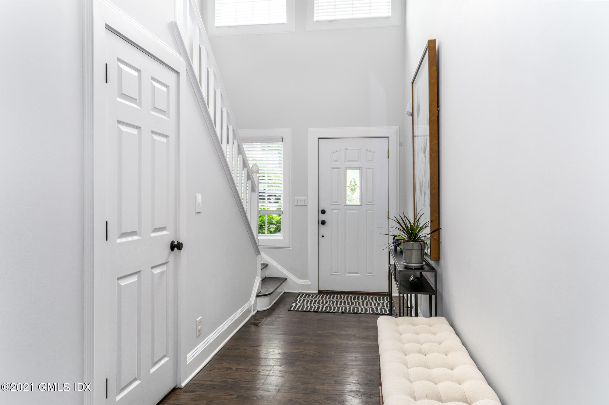 48 Spring Street, Unit 2 Greenwich, CT 06830 - Photo 4 of 36 a view of an entryway with wooden floor
