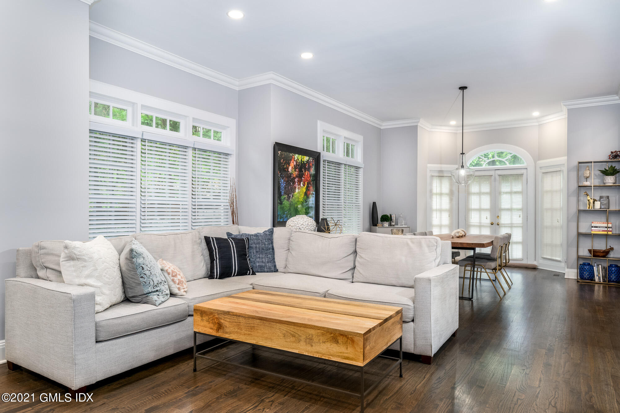 48 Spring Street, Unit 2 Greenwich, CT 06830 - Photo 9 of 36 a living room with furniture and a large window