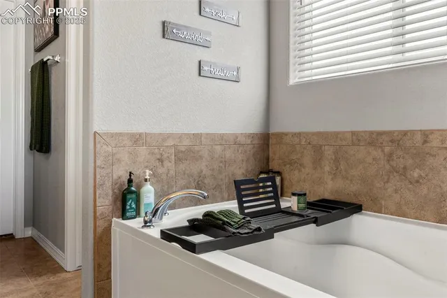 a kitchen with a stove and a refrigerator