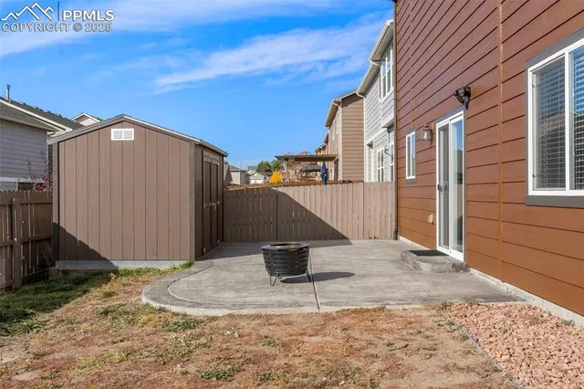 a view of a street with a building in the background