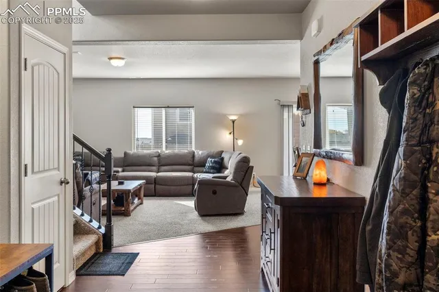a living room with furniture and a window