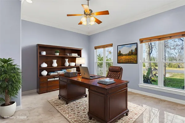 a bathroom with a granite countertop toilet a sink and a bathtub