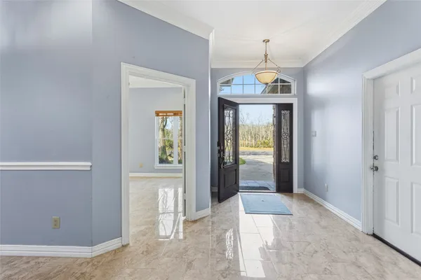 a very nice looking room with a chandelier
