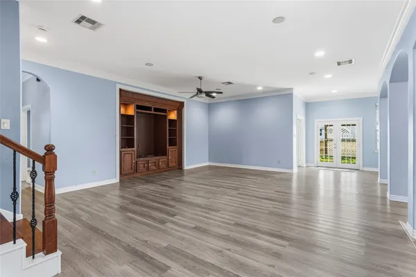 a view of a livingroom with wooden floor