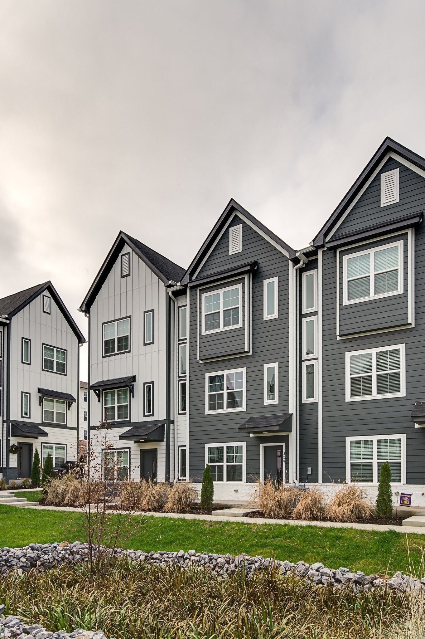 708 North Dupont Avenue Madison, TN 37115 - Photo 3 of 28 a front view of a residential apartment building with a yard