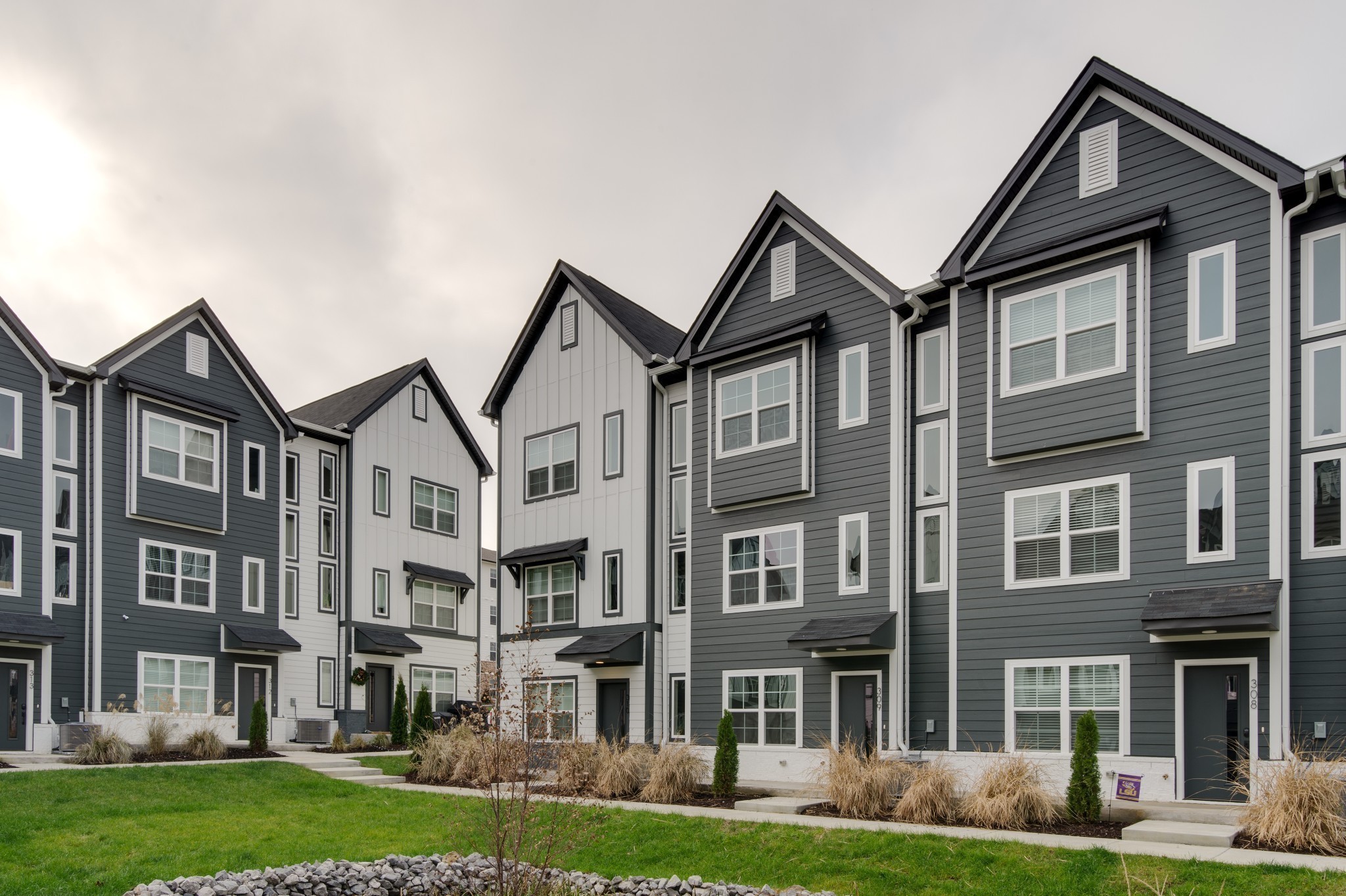 708 North Dupont Avenue Madison, TN 37115 - Photo 5 of 28 a front view of a residential apartment building with a yard