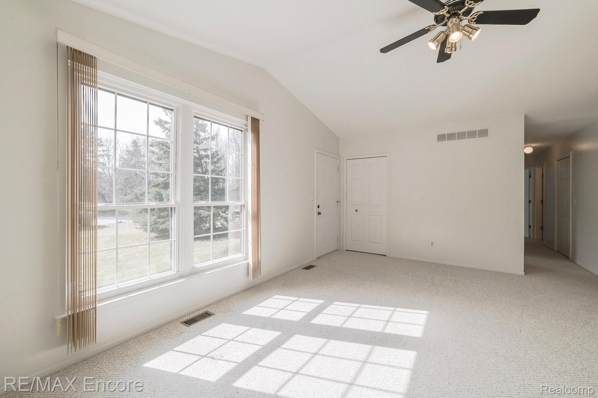90 Pine Tree Ridge, Unit 4 Waterford, MI 48327 - Photo 5 of 18 Pretty view from large living room windows.