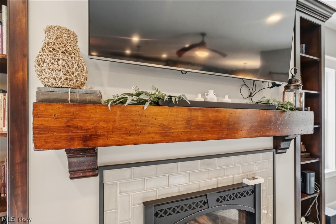 3098 Huntcliffe Road Northeast Canton, OH 44721 - Photo 11 of 45 Handcrafted FIreplae Mantle and Builtins