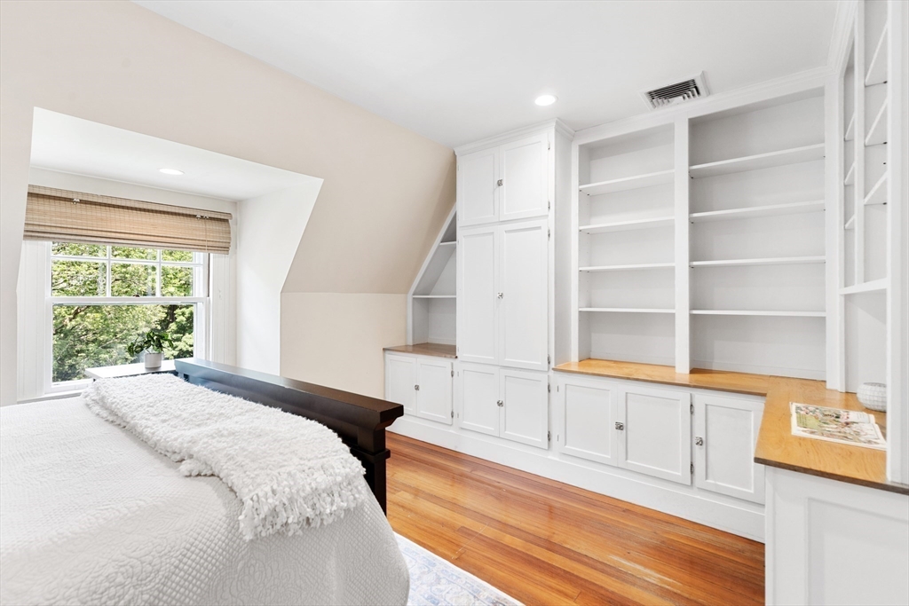 10 Eliot Road Lexington, MA 02421 - Photo 25 of 40 a spacious bedroom with a bed and a window