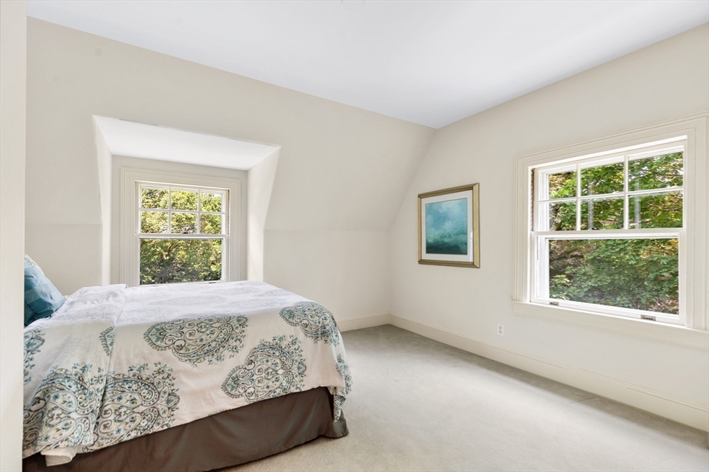 10 Eliot Road Lexington, MA 02421 - Photo 26 of 40 a bedroom with a bed and a window