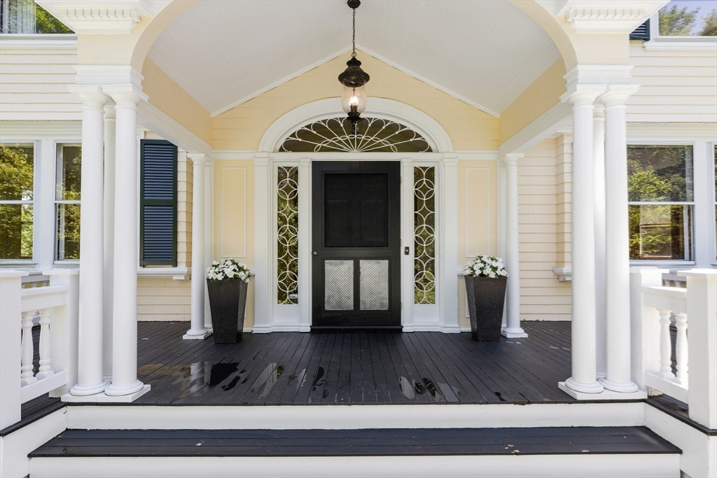 10 Eliot Road Lexington, MA 02421 - Photo 3 of 40 a view of an entrance of the house
