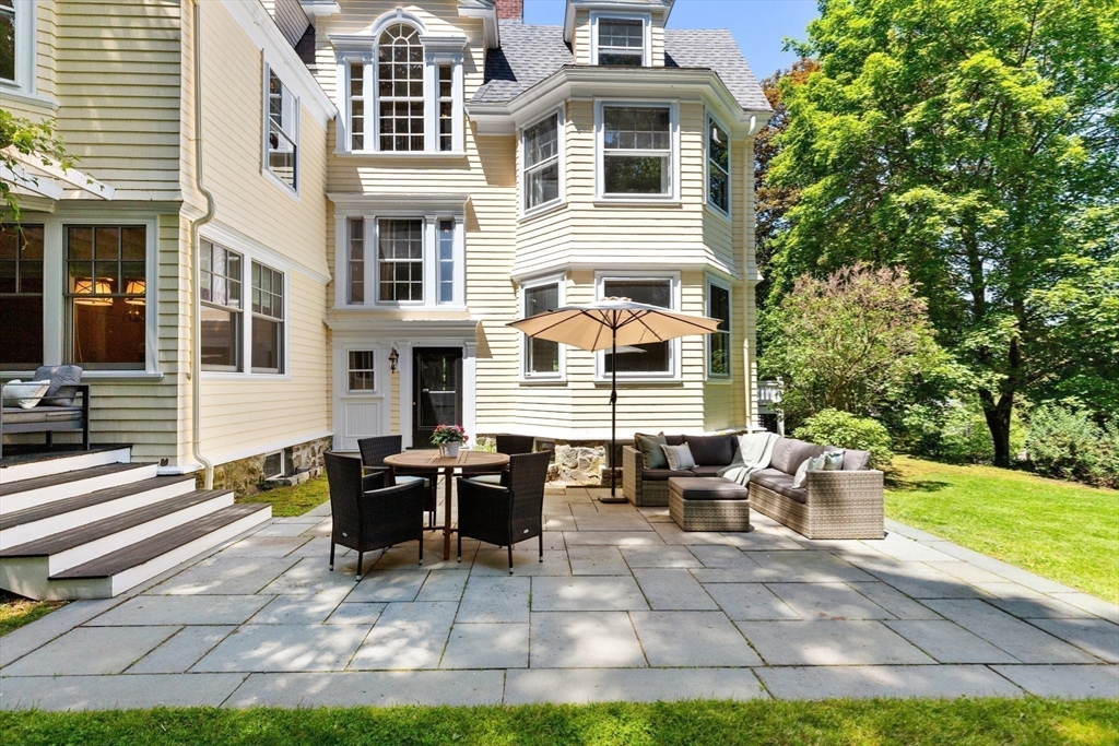 10 Eliot Road Lexington, MA 02421 - Photo 32 of 40 a building outdoor space with patio furniture and garden