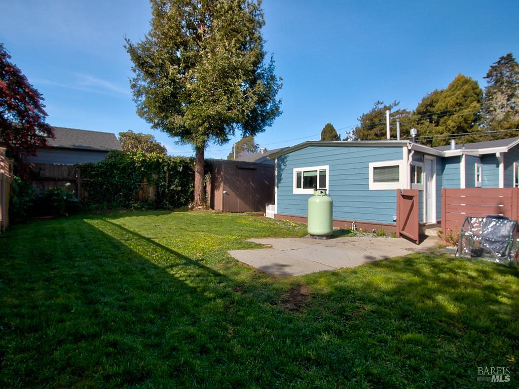 1002 Cedar Street Fort Bragg, CA 95437 - Photo 21 of 26 a view of a house with a yard