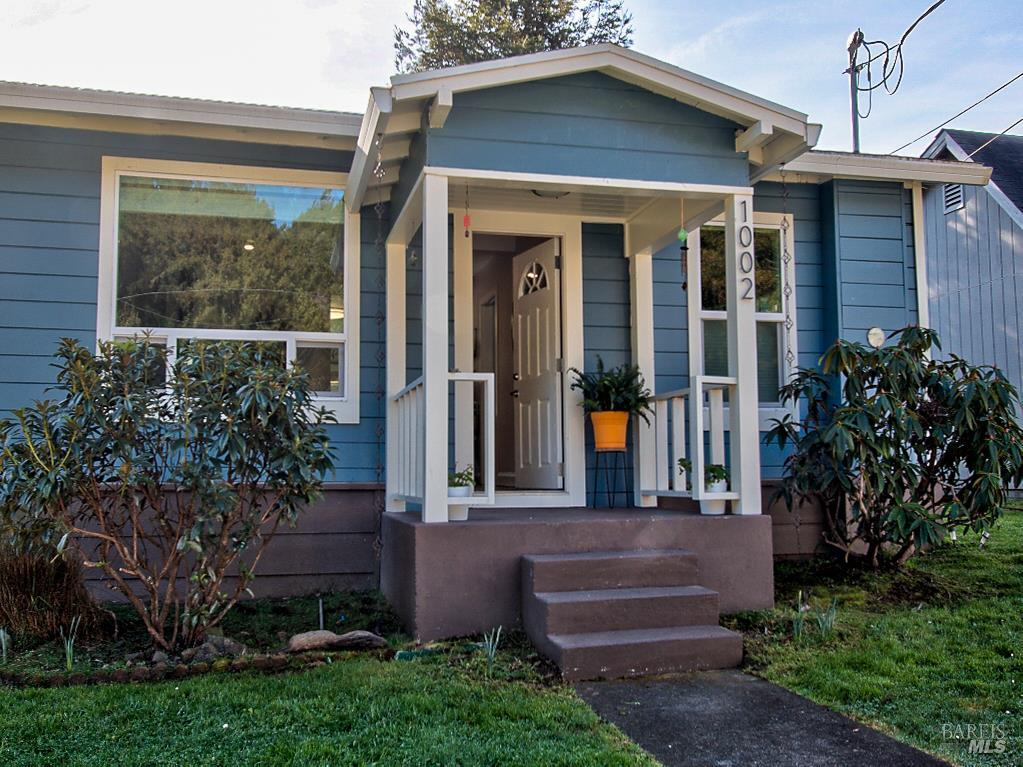 1002 Cedar Street Fort Bragg, CA 95437 - Photo 3 of 26 a front view of a house with garden