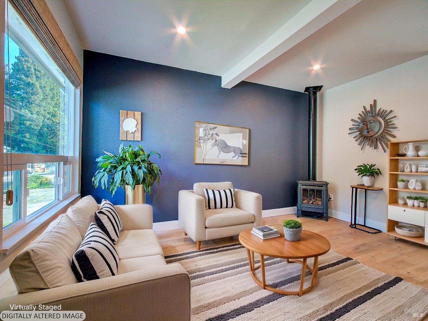 1002 Cedar Street Fort Bragg, CA 95437 - Photo 5 of 26 a living room with furniture and a large window