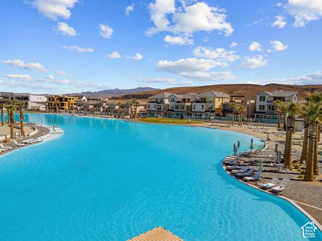 636 Phase 6 Street St. George, UT 84790 - Photo 11 of 16 Expansive turquoise lagoon surrounded by sandy beaches and mature palm trees