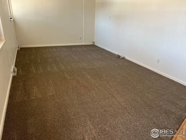 an empty room with a workbench