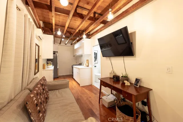 a bedroom with a bed and a closet